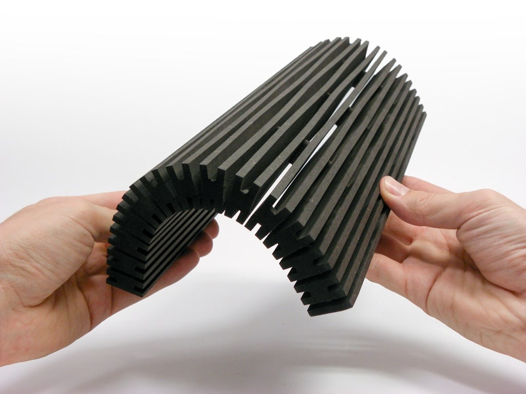 SchmittCo - flexible wood acoustic partition walls - JANUS black sample in hand